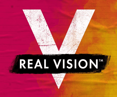 A red and yellow background with the words real vision written in black.